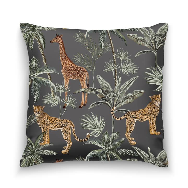 Pillow with pattern consisting of giraffes, foliage and cheetahs.